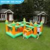 Adventure Kingdom inflatable obstacle course with dual castle sections set up on grass for party rental in Portland Oregon