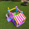 Aerial view of Candy Castle bounce house showing bouncing area slide and striped ball pit canopy near Portland
