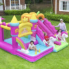 Kids playing on pink princess unicorn bounce house with double slide in backyard - bounce house rental Beaverton Oregon