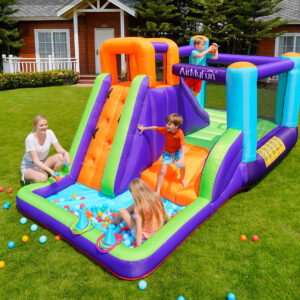 Kids playing on purple and green bounce house combo with slide ball pit and ring toss - bounce house rental Beaverton Oregon