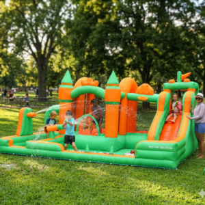 Kids playing on large green and orange enchanted castle splash bouncer with slide and ball pit - water slide rental Beaverton Oregon